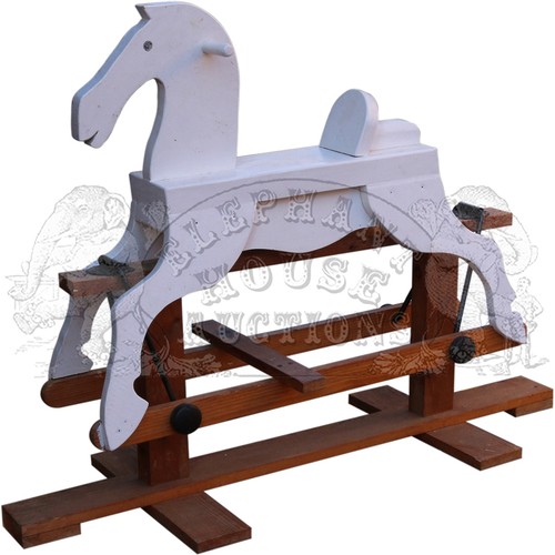 8 - Wooden Rocking Horse - on stand.Approximately 16 inches (40.6 cm) Wide, 32 inches (81.3 cm) High, 43... 