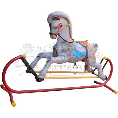 9 - Rocking Horse - plastic horse on steel stand.Approximately 17 inches (43.2 cm) Wide, 33 inches (83.8... 