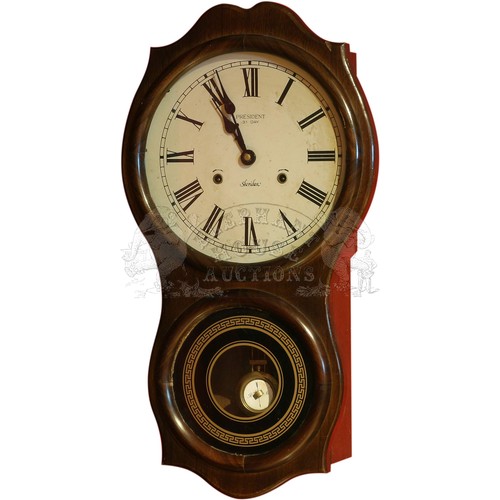 26 - Wall Clock - with pendulum and key.Approximately 12 inches (30.5 cm) Wide, 22.5 inches (57.2 cm) Hig... 