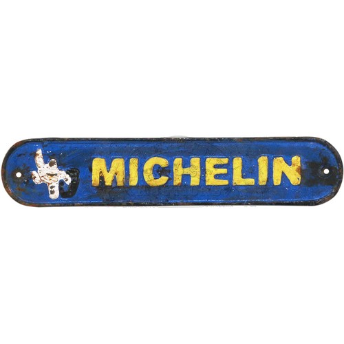 12 - Michelin - cast iron sign. Approximately 10 inches (25.4 cm) Wide, 2 inches (5.1 cm) High.32396... 