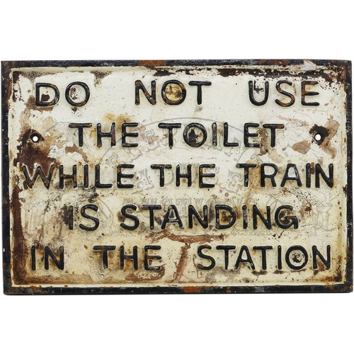 20 - Do Not Use The Toilet ...Whilst The Train Is Standing In The Station cast iron sign. Approximately 1... 