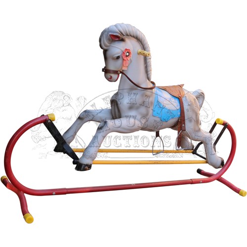 31 - Rocking Horse - plastic horse on steel stand.Approximately 17 inches (43.2 cm) Wide, 33 inches (83.8... 