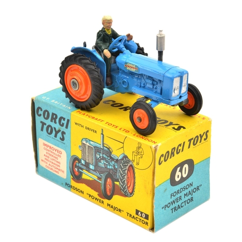 1430 - Corgi Toys Fordson Power Major Tractor (60). Example with lights in radiator, In mid blue with orang... 