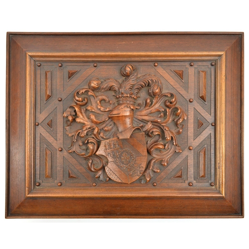 553 - A 19th century German deed (?) box with deeply carved mahogany armorial lid, panelled and bearing pl... 