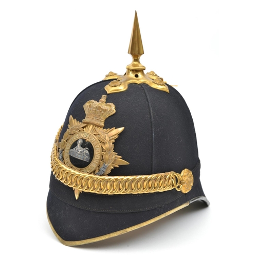 60 - A Victorian officer's blue cloth spiked helmet of The South Staffordshire Regiment, brass peak bindi... 