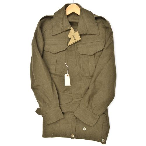 624 - A good WWII Australian infantry OR's khaki BD blouse, factory label d. 1942, and pair of overalls wi... 