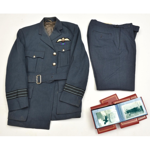 627 - An ERII RAF Wing Commanders greatcoat, tunic with Pilots wings, General Service medal ribbon, and pa... 