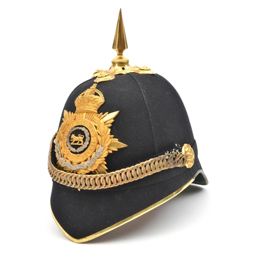 69 - A post-1902 officer's blue cloth spiked helmet of The Hampshire Regiment, gilt peak binding, top mou... 