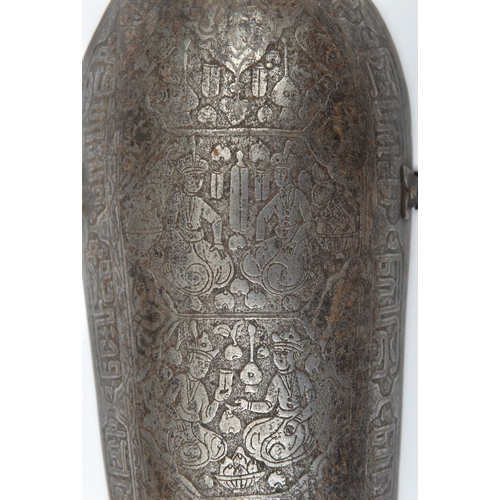 233 - A large Persian iron arm guard bazu band. Qjar dynasty, 38cms etched with pairs of seated figures in... 