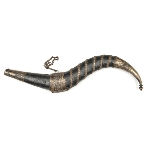 240 - A horn-shaped Indian priming flask. 27cms, fabric covered, swollen in the middle, mounted with press... 