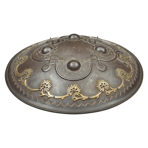 242 - An Indian iron shield dhal. Late 19th century, probably Sialkot, 35.5cms fitted with 4 iron bosses, ... 