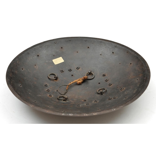 242 - An Indian iron shield dhal. Late 19th century, probably Sialkot, 35.5cms fitted with 4 iron bosses, ... 