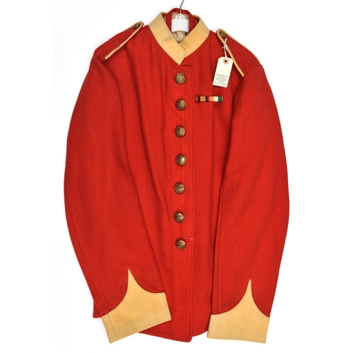 466 - An infantry OR’s undress scarlet frock, yellow facings, Suffolk Regt brass buttons to chest, factory... 