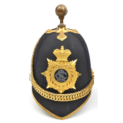 493 - A good Victorian officer’s blue cloth ball topped helmet of the Army Service Corps, gilt peak bindin... 