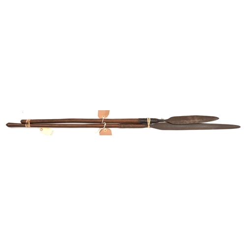 538 - A Zulu stabbing spear, leaf shaped blade 11”, darkwood haft, 39” overall, and another, slender leaf ... 