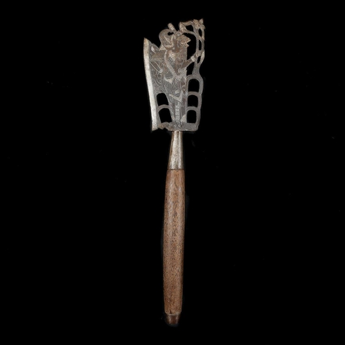 152 - A Balinese ceremonial axe. 20th century, broad iron head pierced and silver damascened with a wayang... 