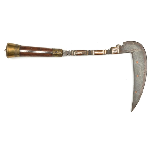 155 - A Banochie throwing pick lohar. First half of the 20th century, sickle shaped blade 18.5cms haft and... 