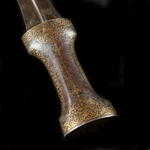 165 - An Indian dagger jambiya, mid 19th century. Curved DE wootz blade 21cms with raised central rib, iro... 