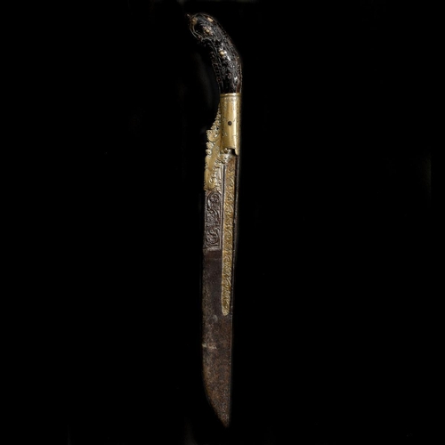 171 - A Ceylonese knife piha kaetta, 19th century. Straight SE blade 20cms with scroll decorated brass ove... 
