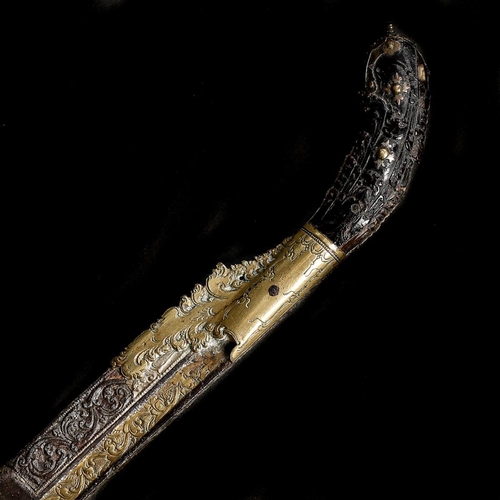 171 - A Ceylonese knife piha kaetta, 19th century. Straight SE blade 20cms with scroll decorated brass ove... 