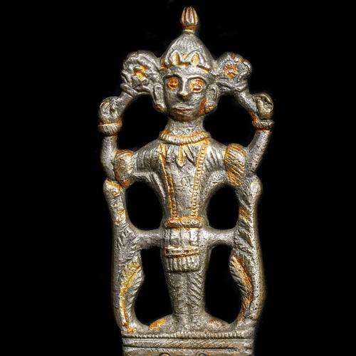 176 - An Indian dagger, 20th century. Cast brass hilt in the form of a deity supported by foliage, broad c... 