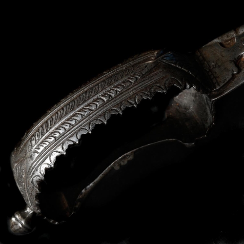 179 - An Indian  steel dagger bich-hwa, c.1800. Recurved DE blade 18cms, iron loop-shaped hilt with serrat... 