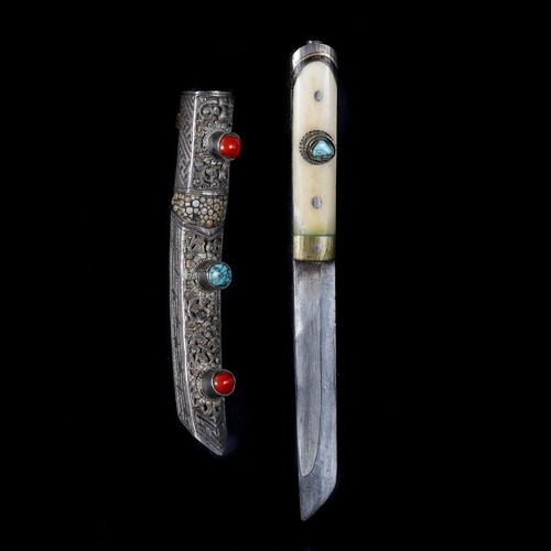184 - A good quality Tibetan knife. Second half of the 20th century, SE fullered blade 9cms, 2 piece bone ... 