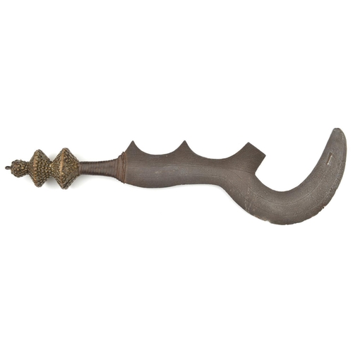 189 - An African Ngala ‘execution’ sword. 19th century, broad iron sickle-shaped blade of distinctive form... 
