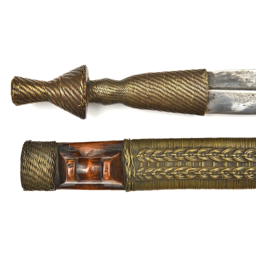 190 - A good African Shona tribal knife bakatwa. c.1900, straight DE blade 29cms with off-set fullers, woo... 