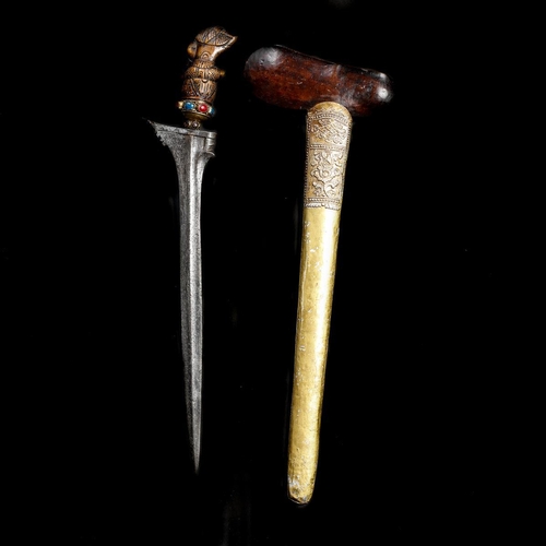 200 - A Balinese dagger kris. Straight pamor blade 37.5cms probably 19th century, wooden hilt carved as Bi... 