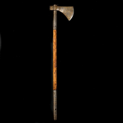 209 - An Ottoman Turkish axe. 19th century, iron head with 8.5cms crescent edge, covered with gold damasce... 