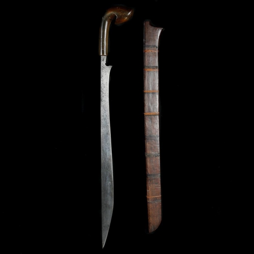 221 - A Sumatran sword kalisan. 19th century, straight swollen SE blade 46cms, buffalo horn hilt sukul jer... 