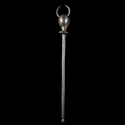 228 - A Persian all iron mace. 73cms, head embossed as a devil’s head with applied horns and bicycle bell-... 