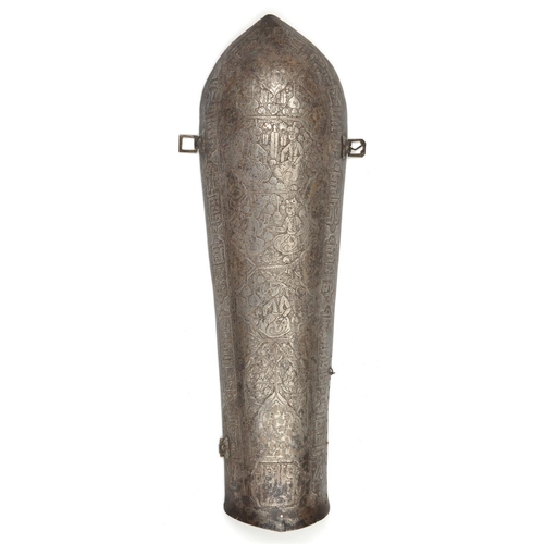 233 - A large Persian iron arm guard bazu band. Qjar dynasty, 38cms etched with pairs of seated figures in... 