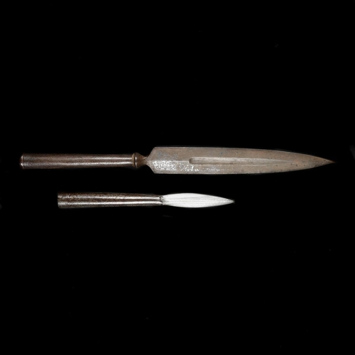 235 - A Persian lance head, Qjar dynasty. Broad DE blade 31.5cms cut with a single fuller and with silver ... 