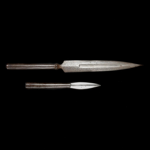 235 - A Persian lance head, Qjar dynasty. Broad DE blade 31.5cms cut with a single fuller and with silver ... 