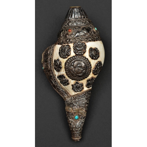 251 - A silver mounted conch shell trumpet dung dkar. Tibet or China, 25cms,  probably first half of the 2... 