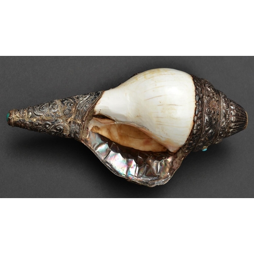 251 - A silver mounted conch shell trumpet dung dkar. Tibet or China, 25cms,  probably first half of the 2... 