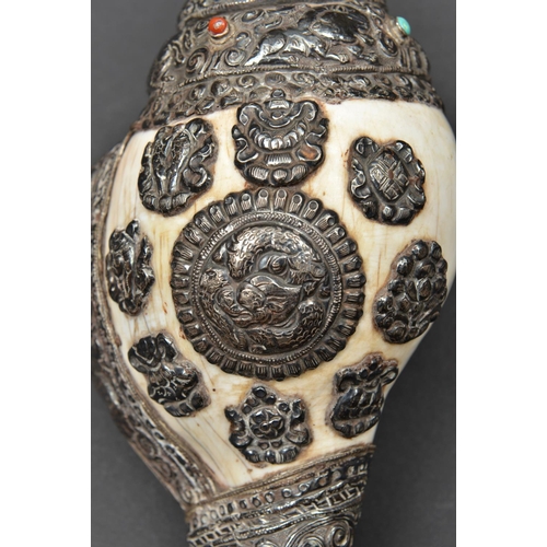 251 - A silver mounted conch shell trumpet dung dkar. Tibet or China, 25cms,  probably first half of the 2... 