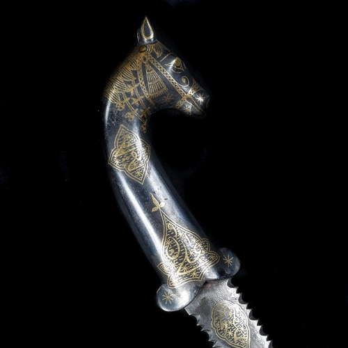 259 - An Indian dagger khanjar. Serrated pattern watered blade 15cms, steel hilt with horse’s head pommel ... 