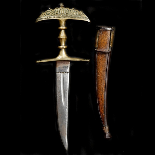 260 - An Indian dagger jamdhar katari from the Hindu Kuch. 19th century, curved double edge blade 19.5cms,... 