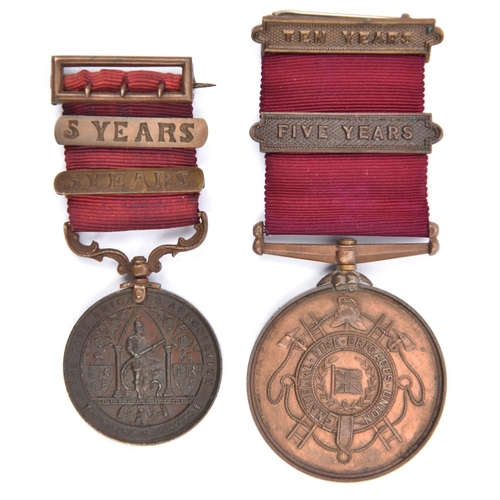 353 - The Fire Brigades Association long service bronze medal, obv Victorian firefighter holding hose, smo... 