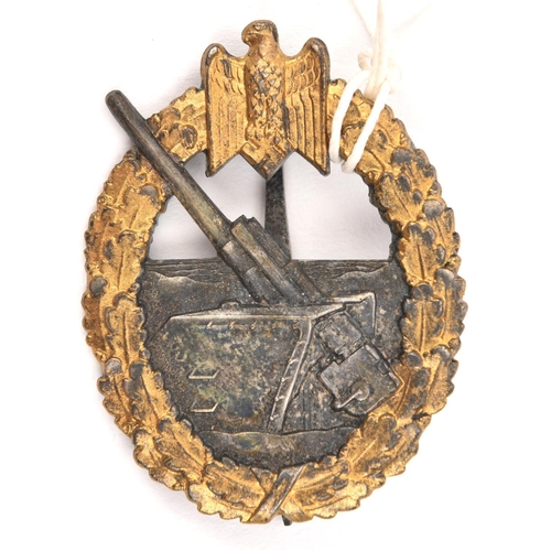 395 - A Third Reich Coastal Artillery badge, by S H u Co (Sohn, Heubach). GC, the gilt good (Beadle does n... 