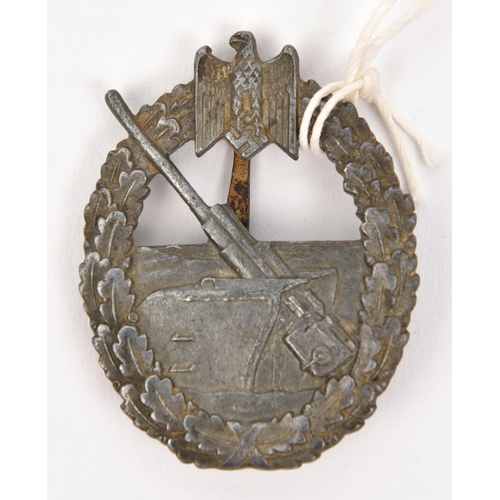 396 - A Third Reich Coastal Artillery badge, no maker’s mark, GC, dull grey with no trace of gilt.        ... 