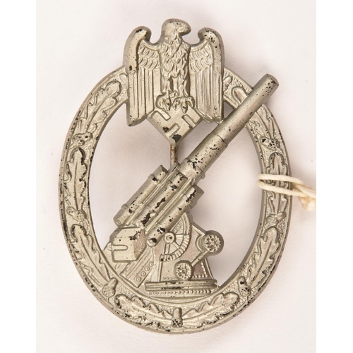 397 - A good Third Reich Army Flak badge, by W H Wien (Wilhelm Hobacher), flat back with round pin, matt s... 