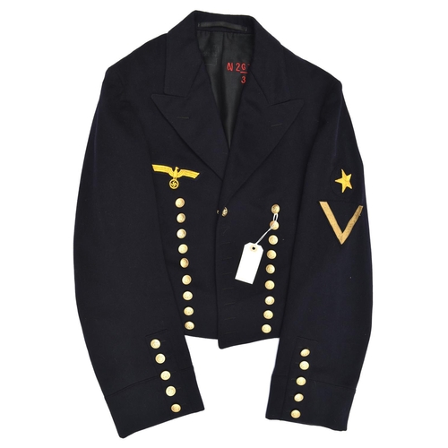 412 - A Third Reich Naval mess dress “monkey jacket”, with embroidered breast eagle and line officer’s sta... 