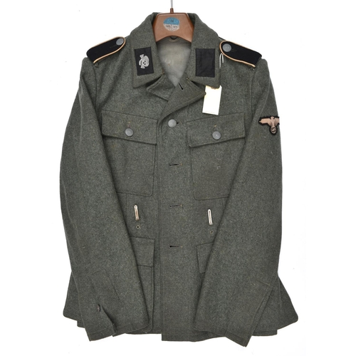 414 - A Third Reich SS man’s 4 pocket tunic, the right hand lining stamped with SS runes and “BW” in recta... 