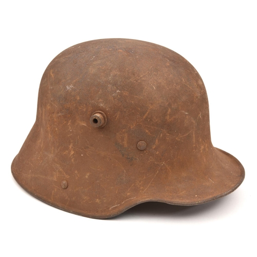 417 - A German M16 steel helmet,  with leather lining. QGC (externally rusted overall, the lining worn and... 