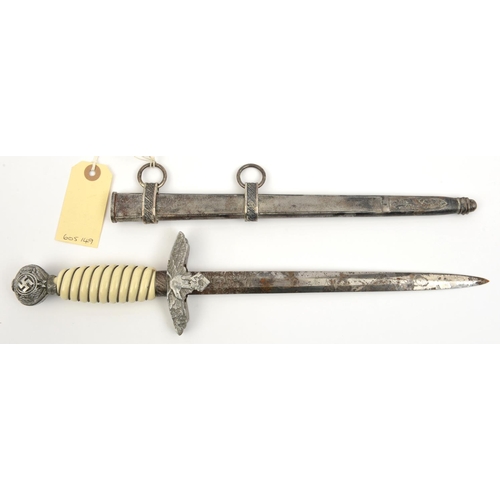 428 - A Third Reich 2nd pattern Luftwaffe officers’ dagger, in its scabbard. QGC (the blade and hilt heavi... 