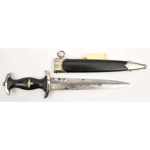 433 - A Third Reich 1933 Model SS dagger, the blade bearing RZM mark over “41/37/SS” and post 1941 Eickhor... 